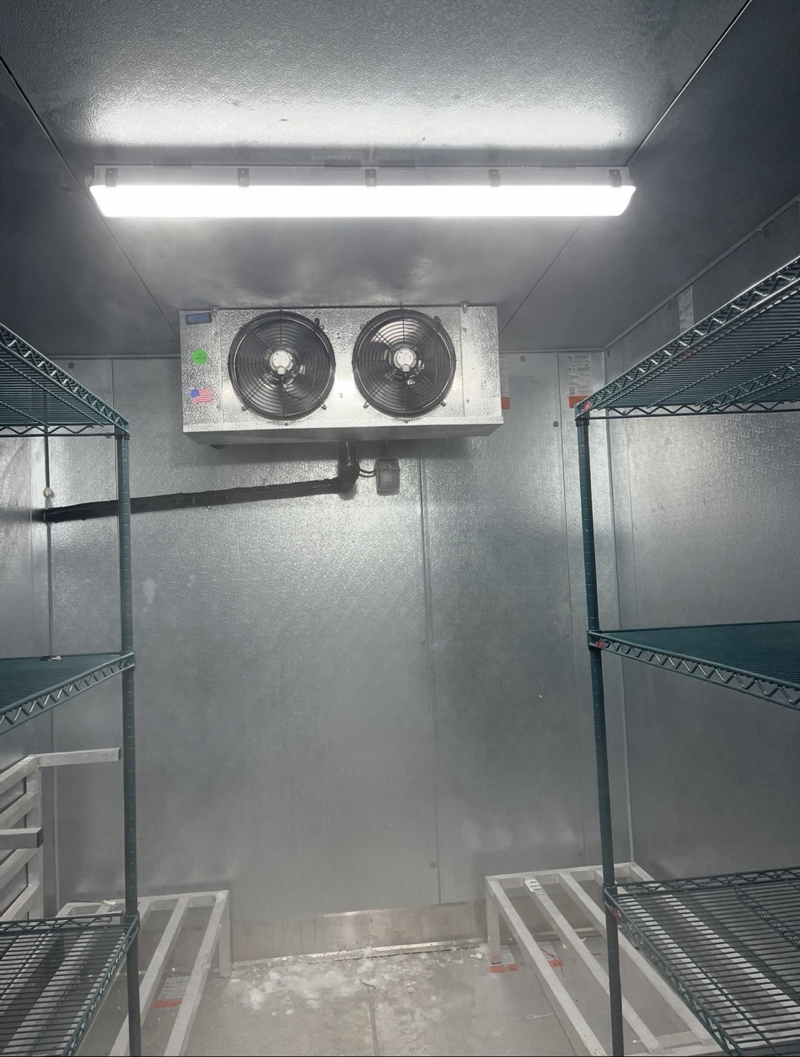 Walk-in cooler evaporator and refrigeration interior